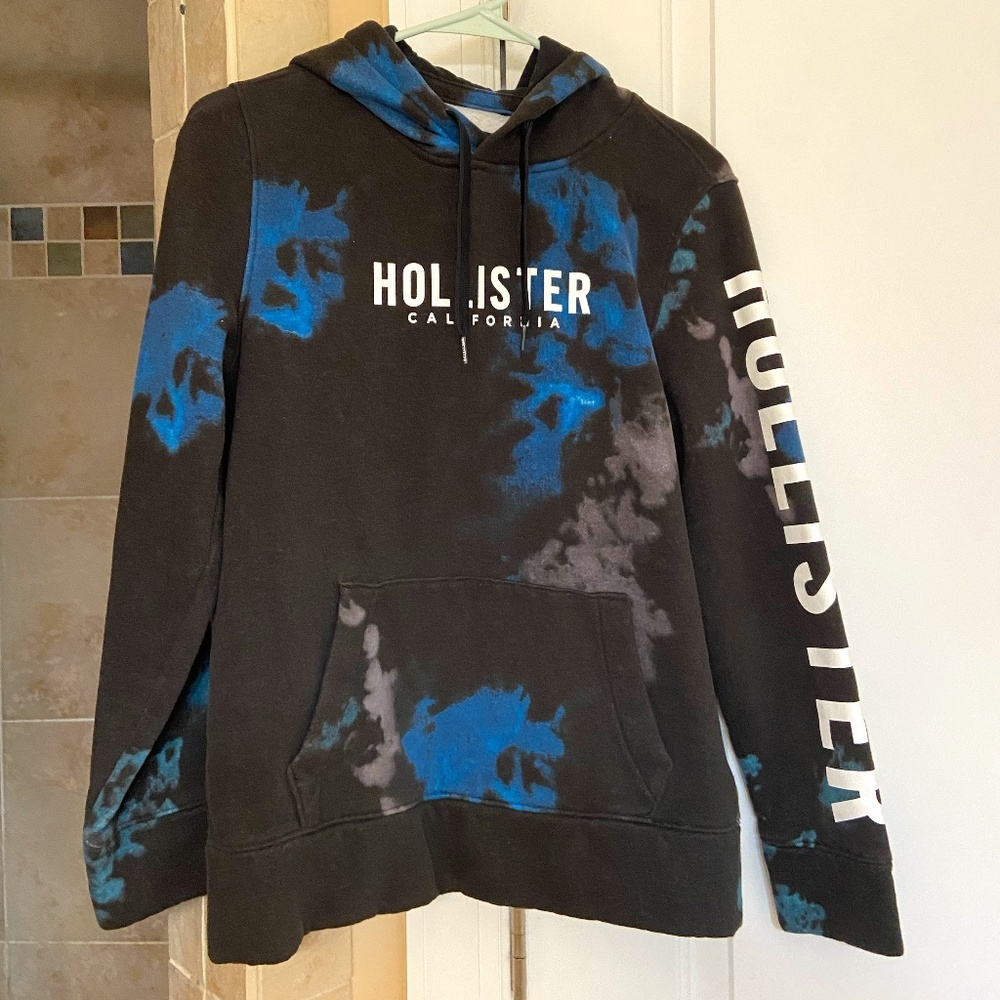 Hollister hoodie in black/blue tie dye with sleeve logo